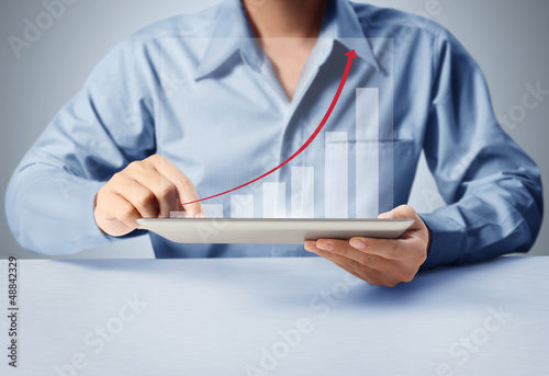 Photo: touch screen tablet with a graph touch screen tablet with a graph