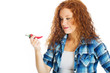 Photo: cute girl thinking about a hot red pepper cute girl thinking about a hot red pepper