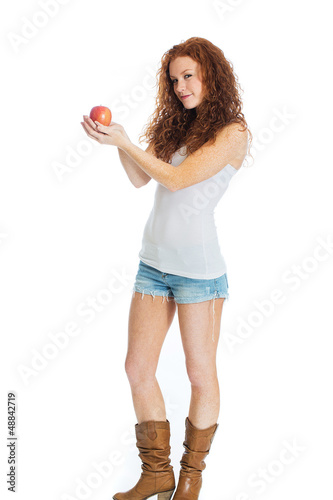 Photo: sexy woman holding an apple sexy woman holding an apple