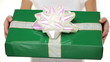 Woman holding showing giving gift