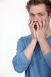 Shocked man on white background