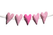 Homemade hearts hanging on clothes line