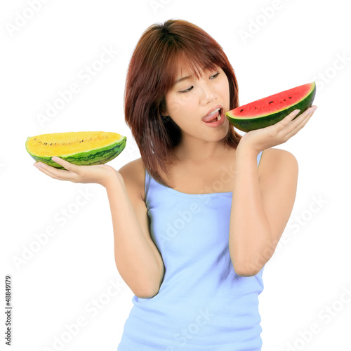Photo: Young Asian Woman with Pieces of Watermelon Young Asian Woman with Pieces of Watermelon