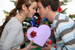 Couple exchanging Christmas gifts