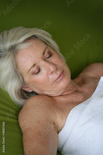 Photo: Woman asleep in a spa Woman asleep in a spa