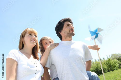 Photo: family walking in the park family walking in the park