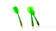 Green and red darts piercing white surface in slow motion
