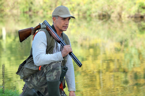 Photo: Hunter stood by the river Hunter stood by the river