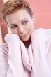 Portrait of attractive woman in pink pullover