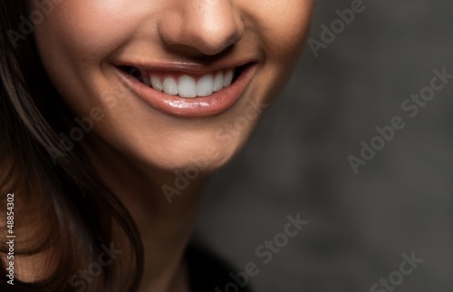 Photo: Closeup view of beautiful smile Closeup view of beautiful smile