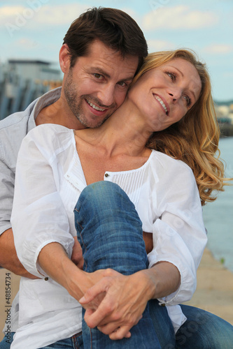 Photo: Couple near water Couple near water