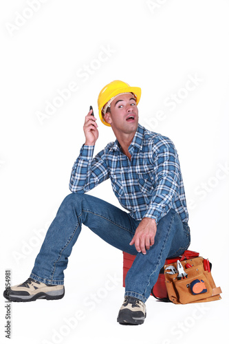Photo: A handyman over the phone. A handyman over the phone.
