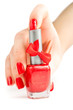 Hand with red manicure and nail polish. isolated