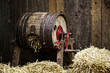 Barrel-type butter churnfilled with straw
