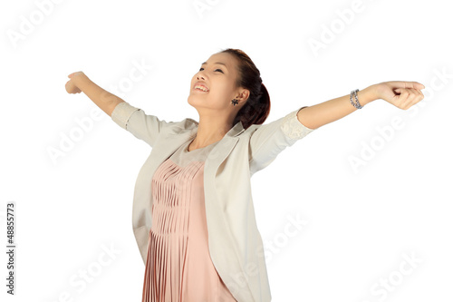 Photo: Isolated young business woman over white Isolated young business woman over white