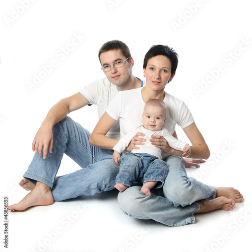 Photo: young parents with child infant young parents with child infant