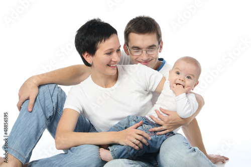 Photo: young parents with child infant young parents with child infant