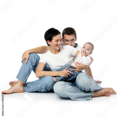 Photo: young parents with child infant young parents with child infant