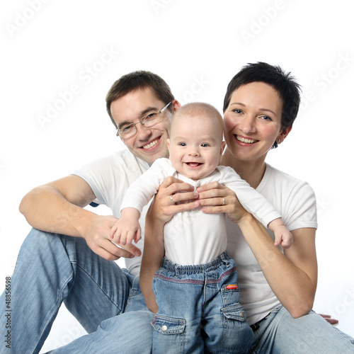 Photo: young parents with child infant young parents with child infant