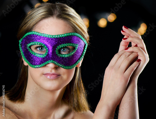 Photo: woman in carnival mask woman in carnival mask