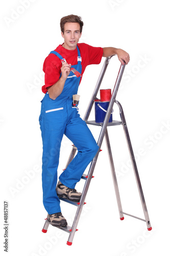 Photo: Painter with ladder and brush Painter with ladder and brush