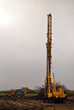 Foto: Baustelle einer Straße mit Bagger Baustelle einer Straße mit Bagger