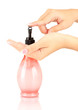 woman squeezing lotion on her hand, on white background