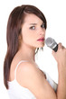 young brunette woman singing