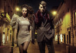 An attractive couple walking downtown