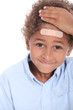 Photo: Little boy with plaster on head Little boy with plaster on head