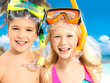 Portrait of the happy children enjoying at beach