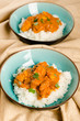 Indian dish - Chicken tikka masala served with rice and garnishe