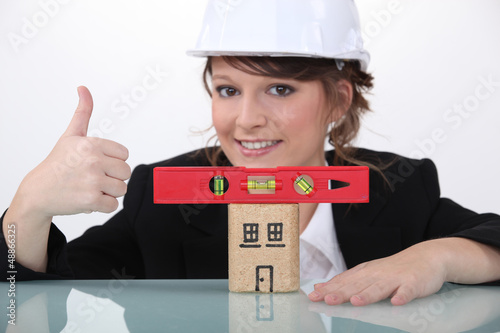 Photo: Engineer approving the use of a spirit level Engineer approving the use of a spirit level