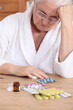 Elderly woman with medicine
