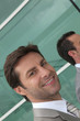 Headshot happy male employee