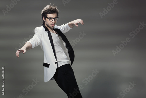 Photo: Handsome guy wearing tuxedo's jacket Handsome guy wearing tuxedo's jacket