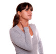 Charming young woman with terrible throat pain