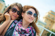 Two happy young beautiful women