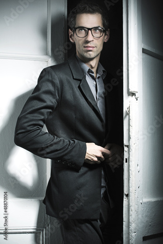 Photo: Smart model wearing black suit Smart model wearing black suit