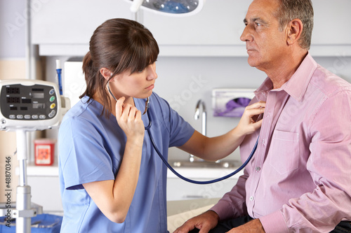 Photo: Male Patient Visiting Doctor's Office Male Patient Visiting Doctor's Office