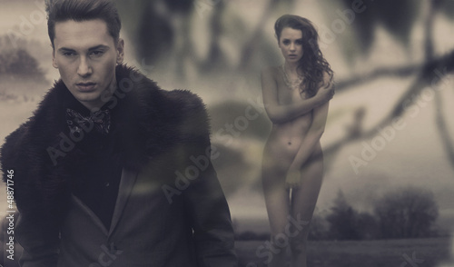 Photo: Fashion male model and nude woman Fashion male model and nude woman