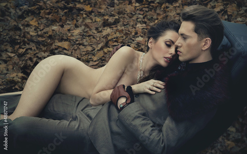 Photo: Naked woman hugging young man Naked woman hugging young man