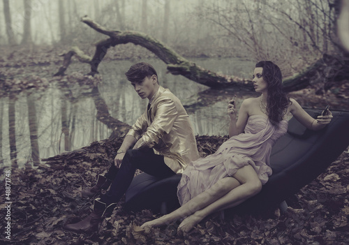 Photo: Sexy couple over nature background Sexy couple over nature background