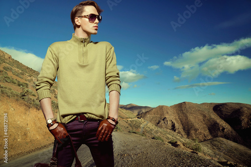 Photo: Fashion photo shot of a man wearing gloves Fashion photo shot of a man wearing gloves