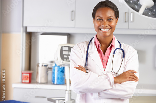 Photo: Portrait Of Female Doctor In Doctor's Office Portrait Of Female Doctor In Doctor's Office