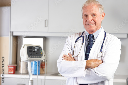 Photo: Portrait Of Doctor In Doctor's Office Portrait Of Doctor In Doctor's Office
