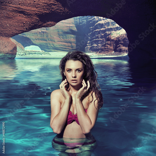 Photo: Perfect shot of brunette lady in paradise Perfect shot of brunette lady in paradise