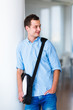 Photo: Handsome college student on campus (shallow DOF; color toned ima Handsome college student on campus (shallow DOF; color toned ima