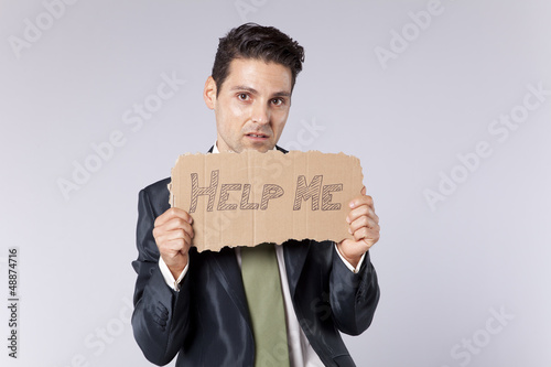 Photo: Businessman that need some help Businessman that need some help