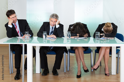 Photo: Bored panel of judges or interviewers Bored panel of judges or interviewers